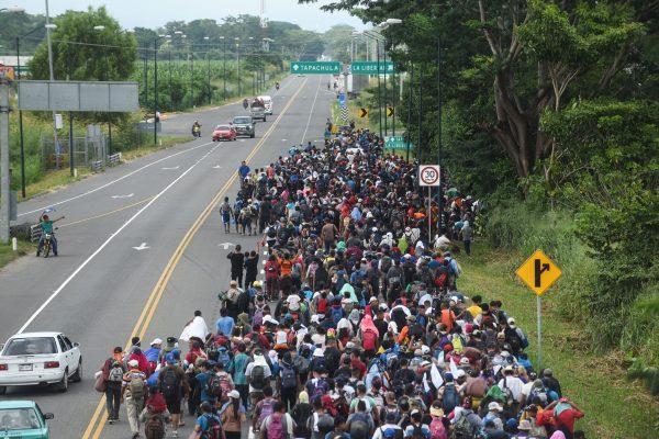 Migrants in a caravan heading to the United States walk alongside the route between Ciudad Hidalgo and Tapachula in Mexico on Nov. 2, 2018. (Johan Ordonez/AFP/Getty Images)