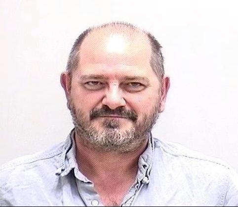 Booking photo showing Richard Douglas Brown, 53, of Trion; mill worker; charged with Trafficking of Persons for Labor Servitude. (Bartow County Sheriff's Office)