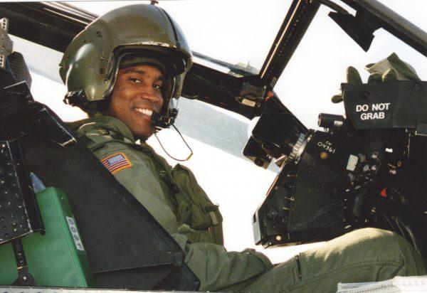 Republican Senate candidate in Michigan John James pictured in a helicopter cockpit during his military service. (John James for Senate)