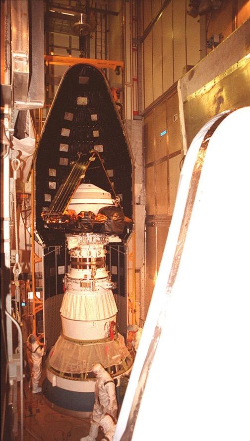 Full view of the Genesis Spacecraft within the faring of a Delta rocket used to launch it into outer space from the Kennedy Space Center in Florida on Aug. 8, 2001. (NASA/JPL)