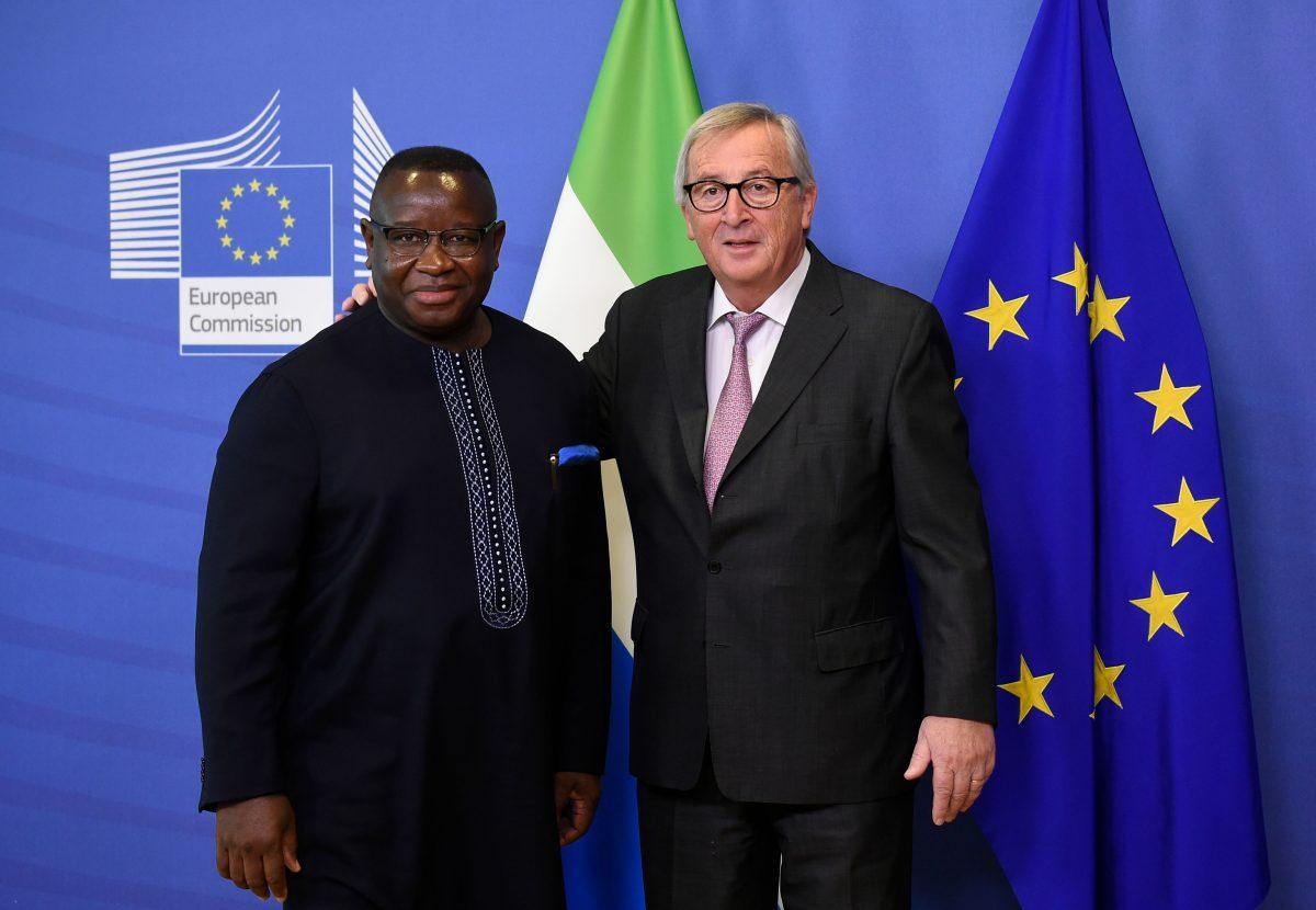 EU Commission President Jean Claude Juncker (R) welcomes President of Sierra Leone Julius Maada Bio, before their meeting at the EU headquarters in Brussels on Nov. 6, 2018. (John Thys/AFP/Getty Images)