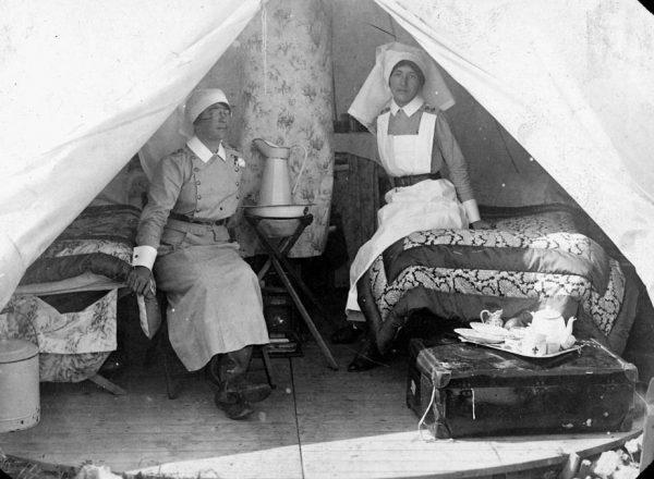Nursing Sisters sitting in their tent at No. 2 Canadian General Hospital in Le Tréport, France, 1917. (Library and Archives Canada)