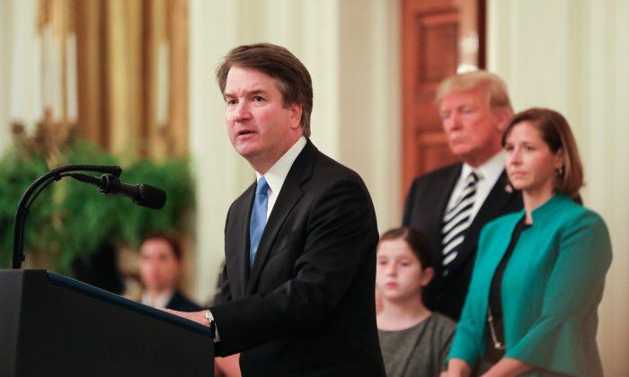 Brett Kavanaugh speaks after being sworn in as an associate justice of the Supreme Court at the White House in Washington, on Oct. 8, 2018. (Holly Kellum/The Epoch Times)