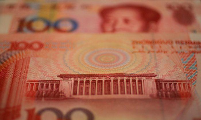 China’s Reserves Fall, Suggesting Beijing Propping Up Yuan