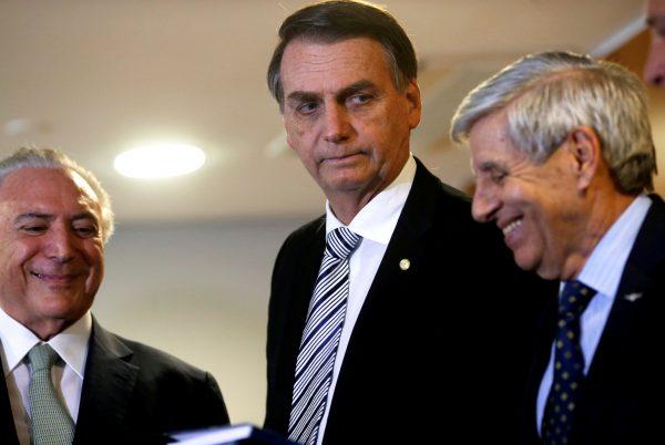 Brazil's President-elect Jair Bolsonaro (C) meets with Brazil's President Michel Temer (L) and his choice for Defense Minister, former General Augusto Heleno, at the Planalto Palace in Brasilia, Brazil, on Nov. 7, 2018. (Adriano Machado/Reuters)