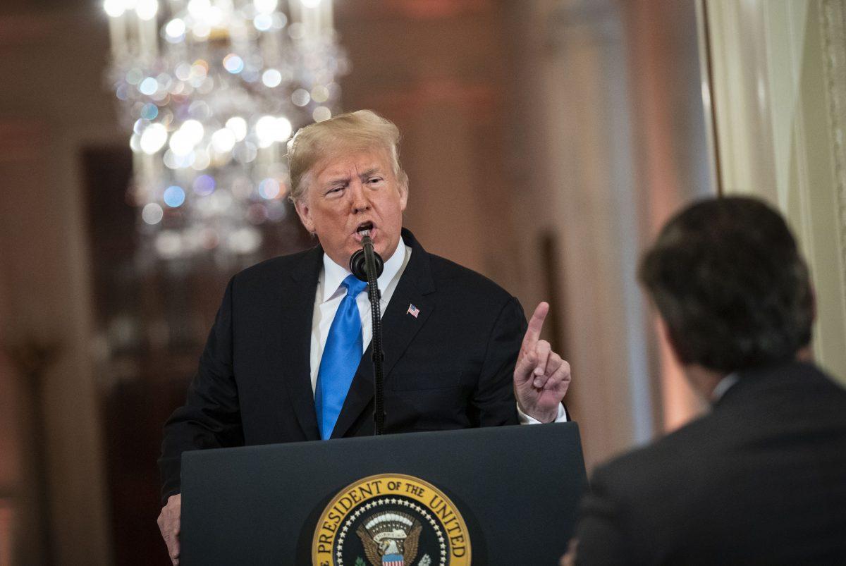 President Donald Trump gets into an exchange with CNN reporter Jim Acosta during a news conference a day after the midterm elections in the East Room of the White House in Washington, on Nov. 7, 2018. (Photo by Al Drago - Pool/Getty Images)