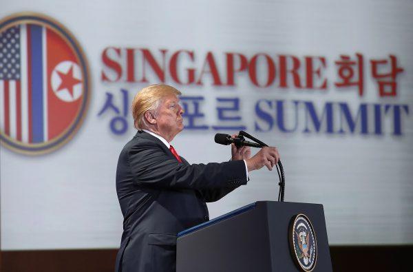 President Donald Trump answers questions during a press conference following his historic meeting with North Korean leader Kim Jong Un in Singapore, on June 12, 2018. (Win McNamee/Getty Images)