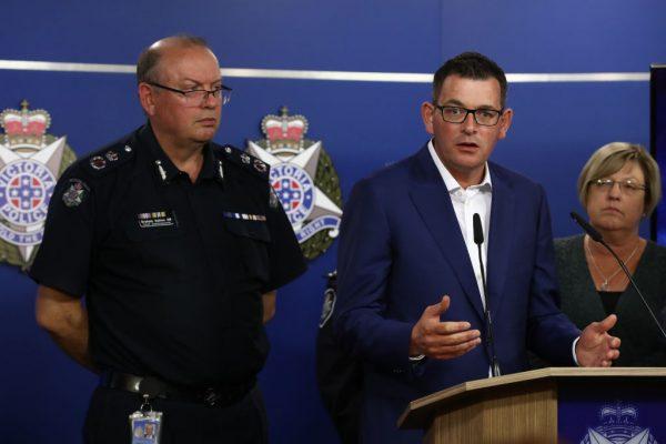 Premier Daniel Andrews speaks to the media as police chief Graham Ashton listens in Melbourne, Australia, on Nov. 9, 2018. (Robert Cianflone/Getty Images)