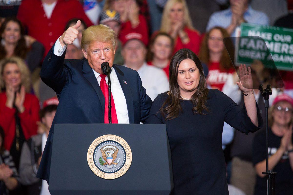 President Donald Trump, and White House Press Secretary Sarah Sanders at a Make America Great Again rally in Cape Girardeau, Mo., on Nov. 5, 2018. (Hu Chen/The Epoch Times)