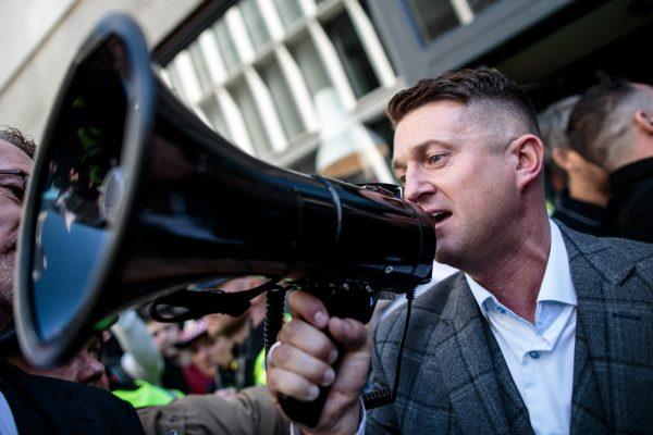 Tommy Robinson uses a megaphone to address supporters outside the Old Bailey, London, on Sept. 27, 2018. (Jack Taylor/Getty Images)