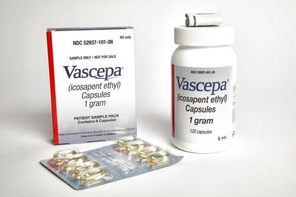 This undated photo, provided by Amarin in November 2018, shows capsules and packaging for Vascepa. (Amarin via AP)