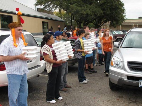 The team prepares Thanksgiving meals with Operation Turkey in 2010. (Courtesy of Operation Turkey)