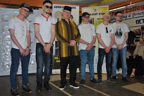 Sen. Isaac Mwaura (2-L) poses for a photo on Oct. 27, 2018, with male contestants that will represent Kenya in the battle for Mr. & Miss Albinism East Africa. (Dominic Kirui/Special to The Epoch Times)