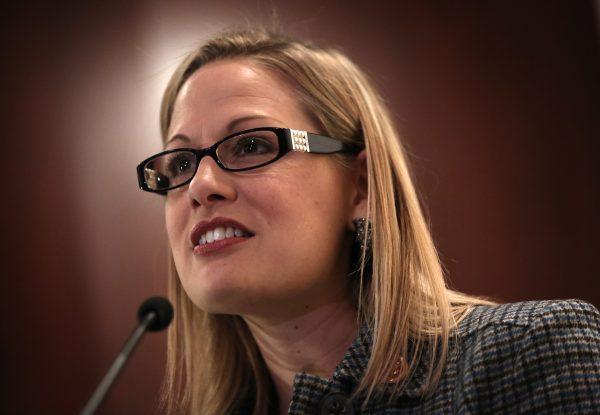 U.S. Rep. Kyrsten Sinema (D-Ariz.) speaks during a Dream Action Coalition discussion on immigration reform on Capitol Hill in Washington, D.C., on Oct. 23, 2013. (Alex Wong/Getty Images)