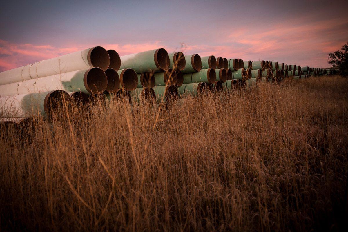 Miles of unused pipe, prepared for the proposed Keystone XL pipeline, sit in a lot outside Gascoyne, N.D., on Oct. 14, 2014. (Andrew Burton/Getty Images)