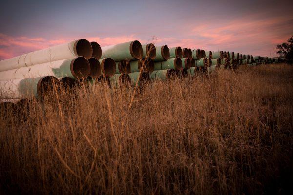 Miles of unused pipe, prepared for the proposed Keystone XL pipeline, sit in a lot outside Gascoyne, North Dakota on Oct. 14, 2014. (Andrew Burton/Getty Images)