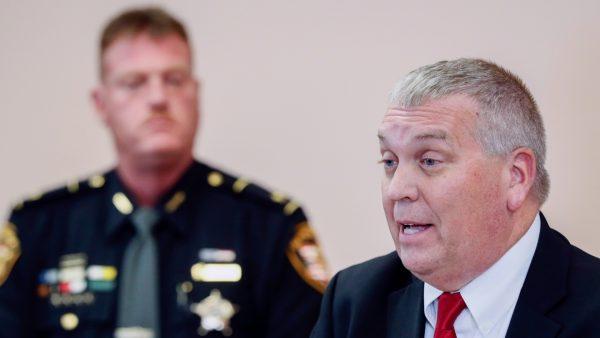 Pike County Prosecutor Rob Junk (R), speaks alongside Pike County Sheriff Charles Reader (L), during a news conference in Waverly, Ohio, on Nov. 13, 2018. (John Minchillo/AP)