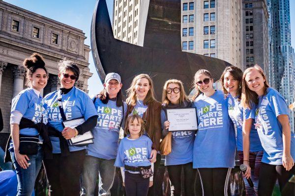 Claire Mysko (C) with her daughter and supporters during a National Eating Disorders Association walk. (Courtesy of the National Eating Disorders Association)