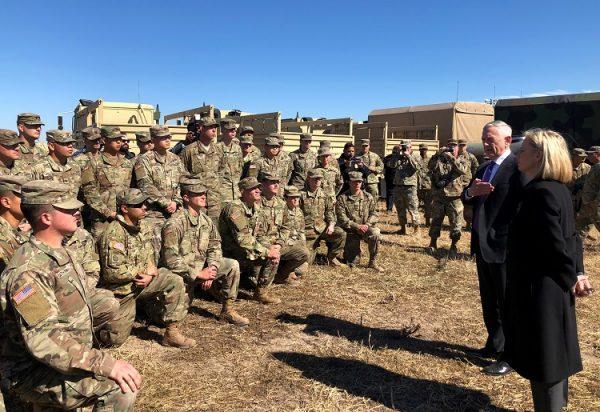 Defense Secretary Jim Mattis and Secretary of Homeland Security Kirstjen Nielsen address troops at Base Camp Donna in Donna, Texas, on Nov. 14, 2018. (Phil Stewart/Reuters)