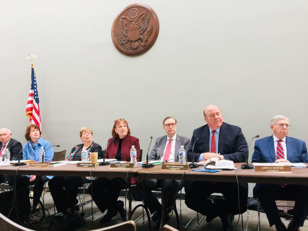 L-R: Commissioner Micheal McDevitt, Commissioner Katherine Tobin, Vice Chairman Carolyn Bartholomew, Chairman Robin Cleveland, Commissioner Glenn Hubbard, Commissioner Roy Kamphausen, and Commissioner Larry Wortzel attending the rollout of the U.S.-China Economic and Security Review Commission report in the Hart Office Building in Washington on Nov. 14, 2018. (Jennifer Zeng/The Epoch Times)