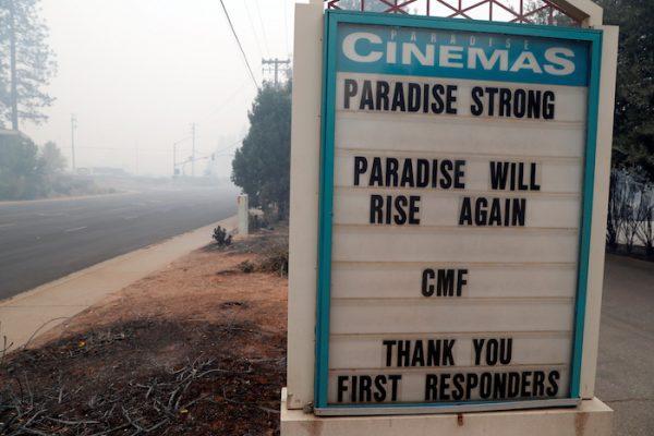 A sign is seen outside of Paradise Cinemas in the aftermath of the Camp Fire in Paradise, California, on Nov. 14, 2018. (Reuters/Terray Sylvester)