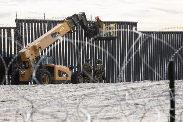Concertina wire is installed on the U.S.-Mexico border fence as seen from Friendship Park in San Ysidro, Calif., on Nov. 15, 2018. (Charlotte Cuthbertson/The Epoch Times)