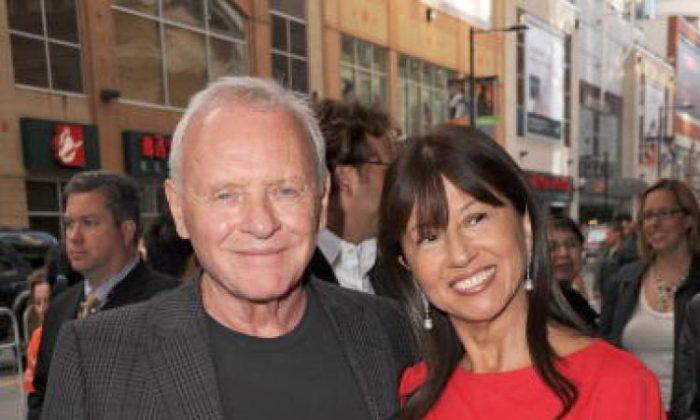 Anthony Hopkins and Stella Arroyave arrive at the 'You Will Meet A Tall Dark Stranger' Premiere held at the Hyatt Regency during the 35th Toronto International Film Festival on September 12, in Toronto, Canada. (Jason Merritt/Getty Images )