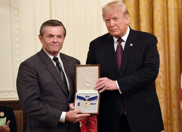 President Donald Trump awards the Presidential Medal of Freedom to baseball legend Babe Ruth, his grandson Thomas Stevens accepting, at the White House in Washington, on Nov. 16, 2018. (Saul Loeb/AFP/Getty Images)