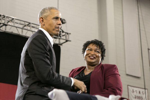 Former President Barack Obama stands with Georgia Democratic gubernatorial candidate Stacey Abrams during a campaign rally at Morehouse College on Nov. 2, 2018, in Atlanta, Ga. Obama spoke in Atlanta to endorse Abrams and encourage Georgians to vote. (Jessica McGowan/Getty Images)