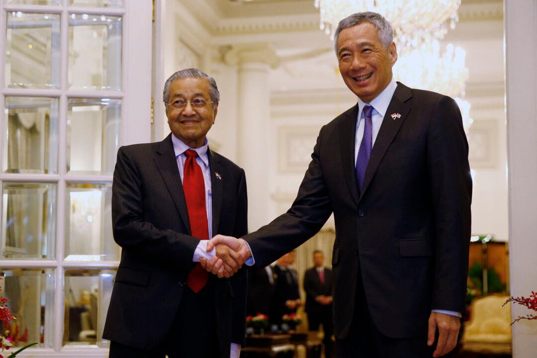 Malaysia and Singapore Vow to Strengthen Ties Amid Water Agreement Dispute