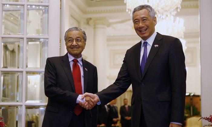 Malaysia and Singapore Vow to Strengthen Ties Amid Water Agreement Dispute