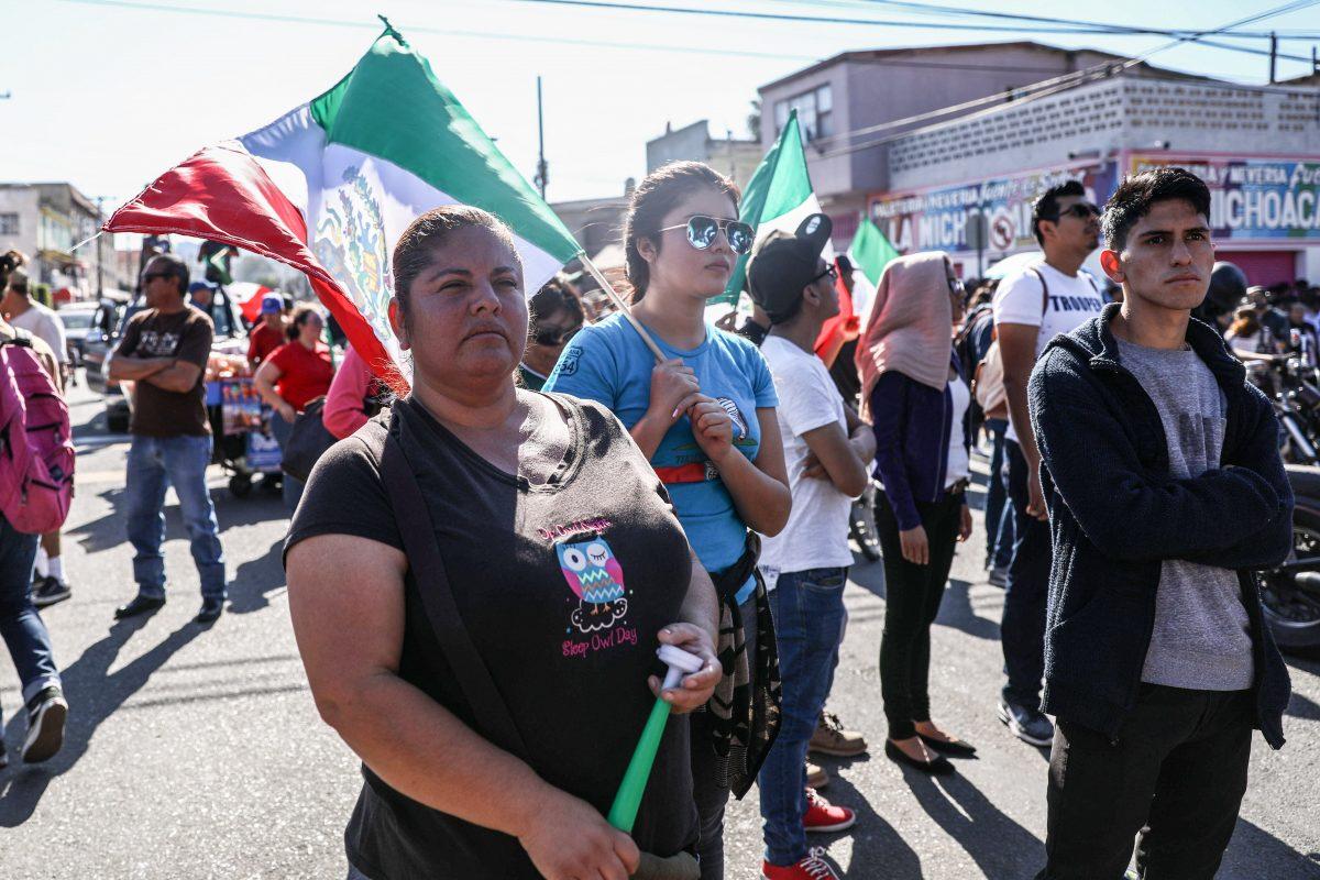 Elvia Villegas protests the migrant caravan from Central America in Tijuana, Mexico, on Nov. 18, 2018. (Charlotte Cuthbertson/The Epoch Times)