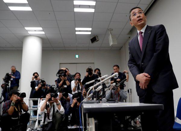 Nissan President and Chief Executive Officer Hiroto Saikawa arrives to attend a news conference after Japanese media reported that Nissan Chairman Carlos Ghosn will be arrested on suspicion of under-reporting his salary, at the company headquarters in Yokohama, south of Tokyo, Japan, on Nov. 19, 2018. (Issei Kato/Reuters)