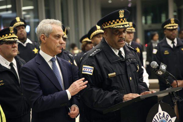 Chicago Mayor Rahm Emanuel (L), comforts Chicago Police Superintendent Eddie Johnson, on Nov. 19, 2018, during a news conference at the University of Chicago Medical Center, in Chicago, after a gunman opened fire at Mercy Hospital, killing a police officer and two hospital employees. (Chris Walker/Chicago Tribune via AP)