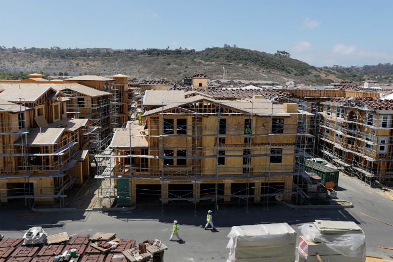 Development and construction continues on a housing project in Oceanside, Calif., on June 25, 2018. (Mike Blake/Reuters)