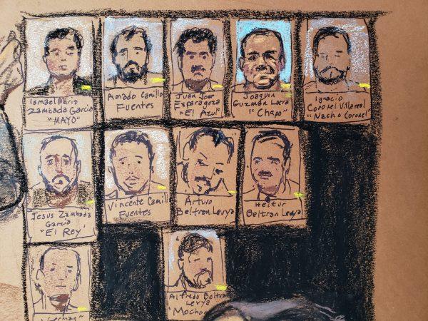Photos showing hierarchy of cartel is on display during the trial of the accused Mexican drug lord Joaquin "El Chapo" Guzman (not whown), in this courtroom sketch in Brooklyn federal court in New York, on Nov. 19, 2018. (Jane Rosenberg/Reuters)