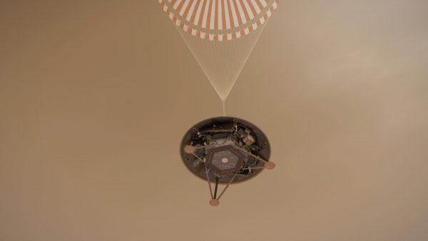 This illustration shows a simulated view of NASA's InSight lander descending on its parachute toward the surface of Mars. (NASA/JPL-Caltech)
