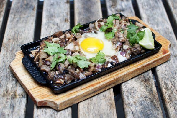 Leah Cohen's interests shifted from Italian cuisine to southeast Asian fare, such as the Sizzling Sisig dish at Pig and Khao. (Georgina Richardson)