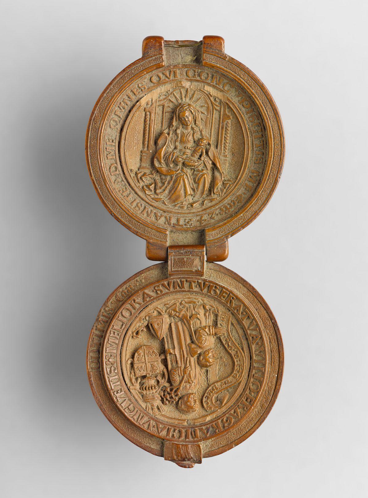 "Prayer nut for the Carthusian François du Puy,” circa 1517-21, by Adam Dircksz and Workshop. Boxwood, 1 7/8 inches in diameter. Private Collection. (The Frick Collection)