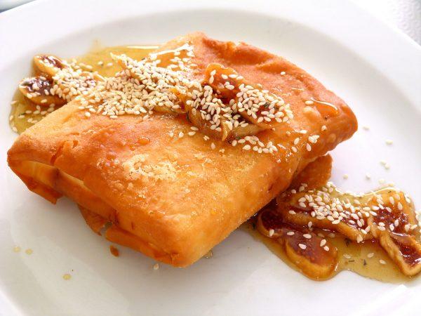 Deep-fried phyllo pastry stuffed with mizithra. (Manos Angelakis)