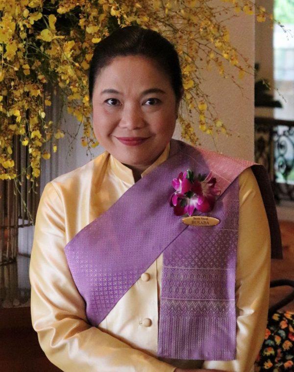 Busaba Sattabun, Dusit Thani Bangkok guest relations manager, says she’s very sad that the hotel will soon close and be demolished. (Ross Duncan/Special to The Epoch Times)