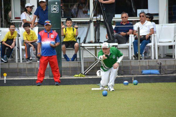 Irishman Ian McClure competing, on his way with his partner Aaron Tennant to lifting the pairs title of the Hong Kong International Bowls Classic last Sunday, Nov 18 after coming from behind to defeat a Filipino team skipped by Angelo Morales. (Stephanie Worth)