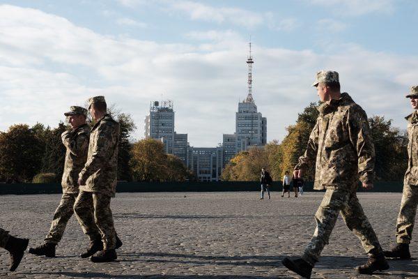 Ukrainian soldiers walk through the central square of Kharkiv on Oct. 11, 2018 ahead of Defender of Ukraine Day in October. (Chris Collison/Special to The Epoch Times)