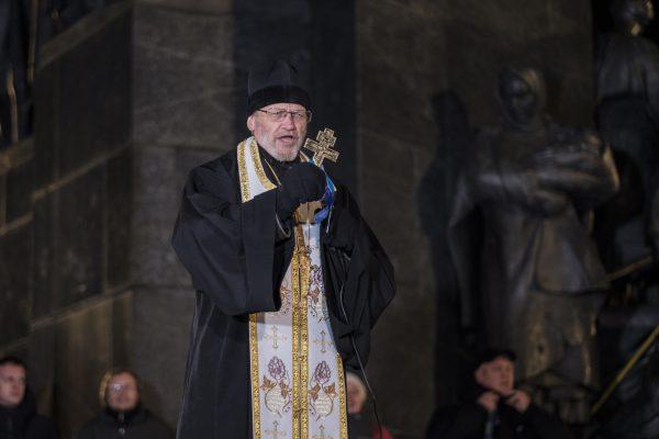 Viktor Marynchak, a Ukrainian Orthodox priest, addresses people gathered in Kharkiv, Ukraine, on Nov. 21, 2018 for events commemorating the five year anniversary of the Nov. 2013 protests that resulted in the ouster of President Viktor Yanukovych. (Chris Collison/Special to The Epoch Times)