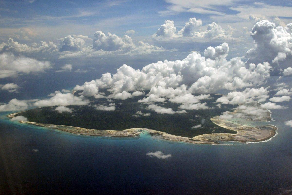 Clouds hang over the North Sentinel Island, in India's southeastern Andaman and Nicobar Islands. An American is believed to have been killed by an isolated Indian island tribe known to fire at outsiders with bows and arrows, Indian police said on Nov. 21, 2018. (Gautam Singh/AP)