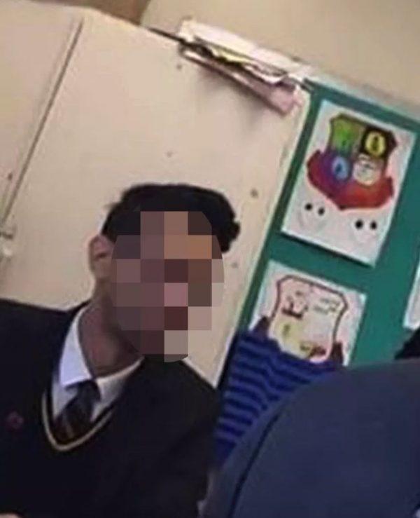 A photograph of the alleged adult asylum-seeker was taken by a student at Stoke High School Ormiston Academy in Ipswich and shared on Snapchat. (Screengrab via Facebook)