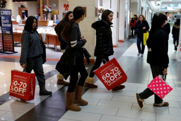 People shop during the Black Friday sales shopping event at Roosevelt Field Mall in Garden City, New York, on Nov. 23, 2018. (Shannon Stapleton/Reuters)