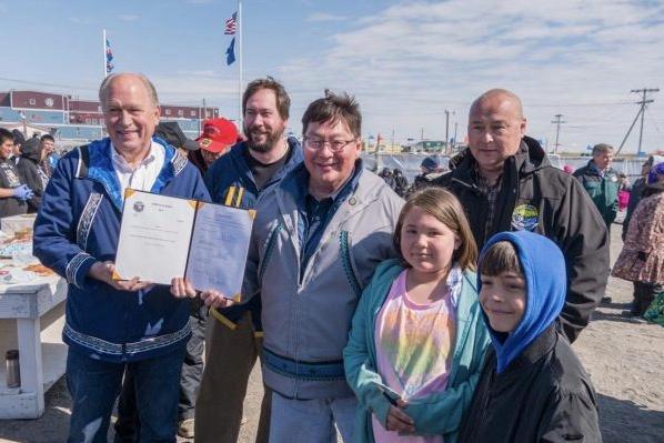 File photo showing Gov. Bill Walker posing for a group photo after signing Indigenous Peoples Day into state law, in Utqiagvik, June 24, 2017. (Office of Governor of Alaska)