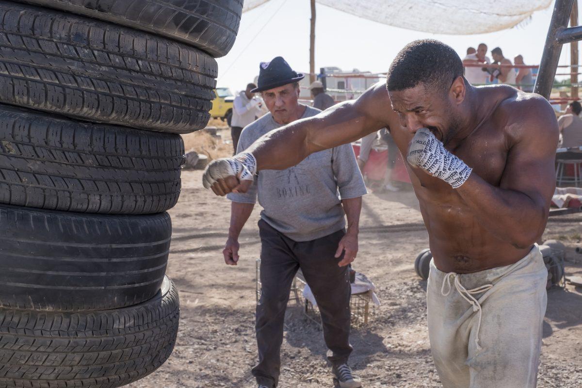 Rocky Balboa (Sylvester Stallone, L) and Adonis Creed (Michael B. Jordan) in “Creed II.”  (Barry Wetcher/Metro Goldwyn Mayer Pictures/Warner Bros. Pictures)