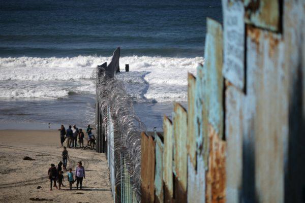 The U.S.-Mexico border fence stretches into the Pacific Ocean in Tijuana, Mexico, on Nov. 23, 2018. (Lucy Nicholson/Reuters)
